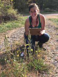 Me recording data on our first sumpweed find